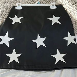 Princess Polly faux leather star skirt.